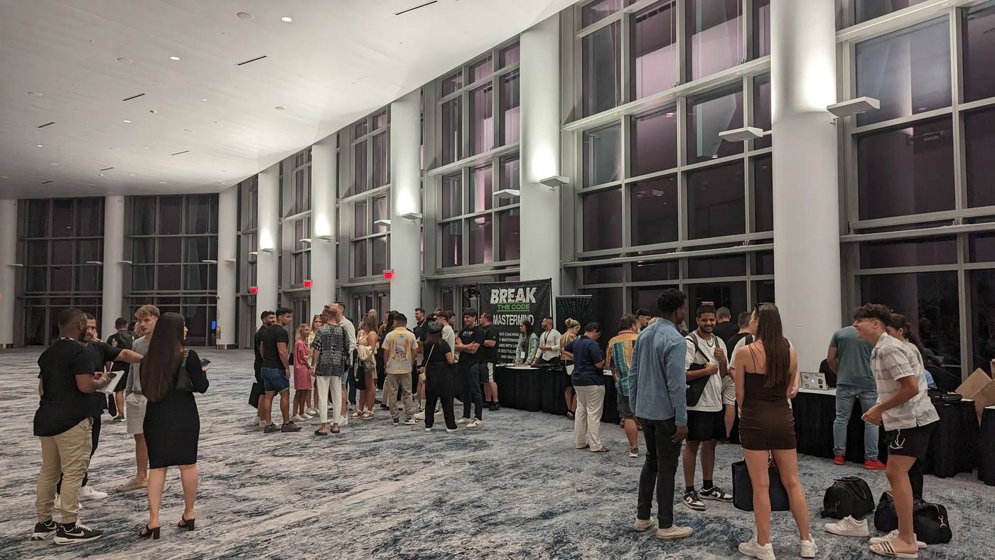 Attendees gathering in an event venue lobby